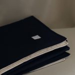 Picture of our large, soft, cotton, black Islamic prayer rug with padding.